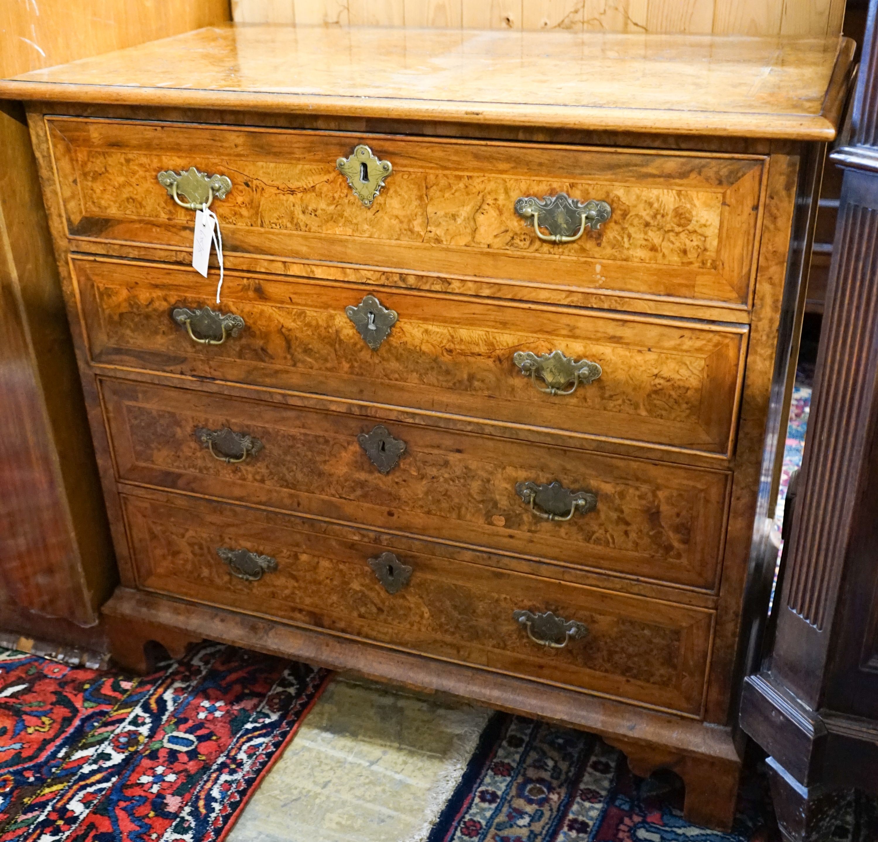 An 18th century burr walnut, banded and inlaid chest, possibly Dutch